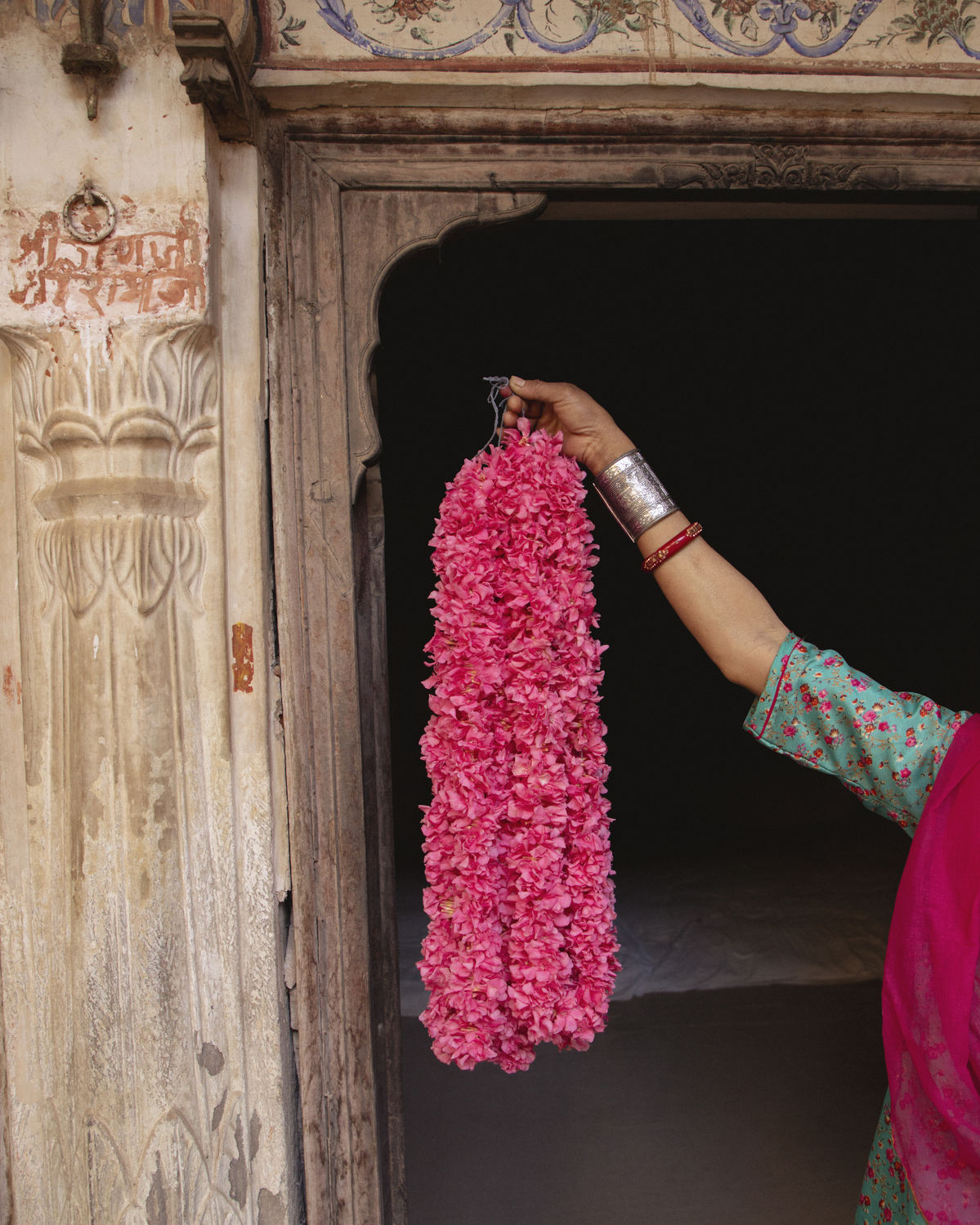 Jaipur's terracotta-pink sandstone architecture glowing in the warm rose-gold light of early morning, the Pink City of Rajasthan, India.