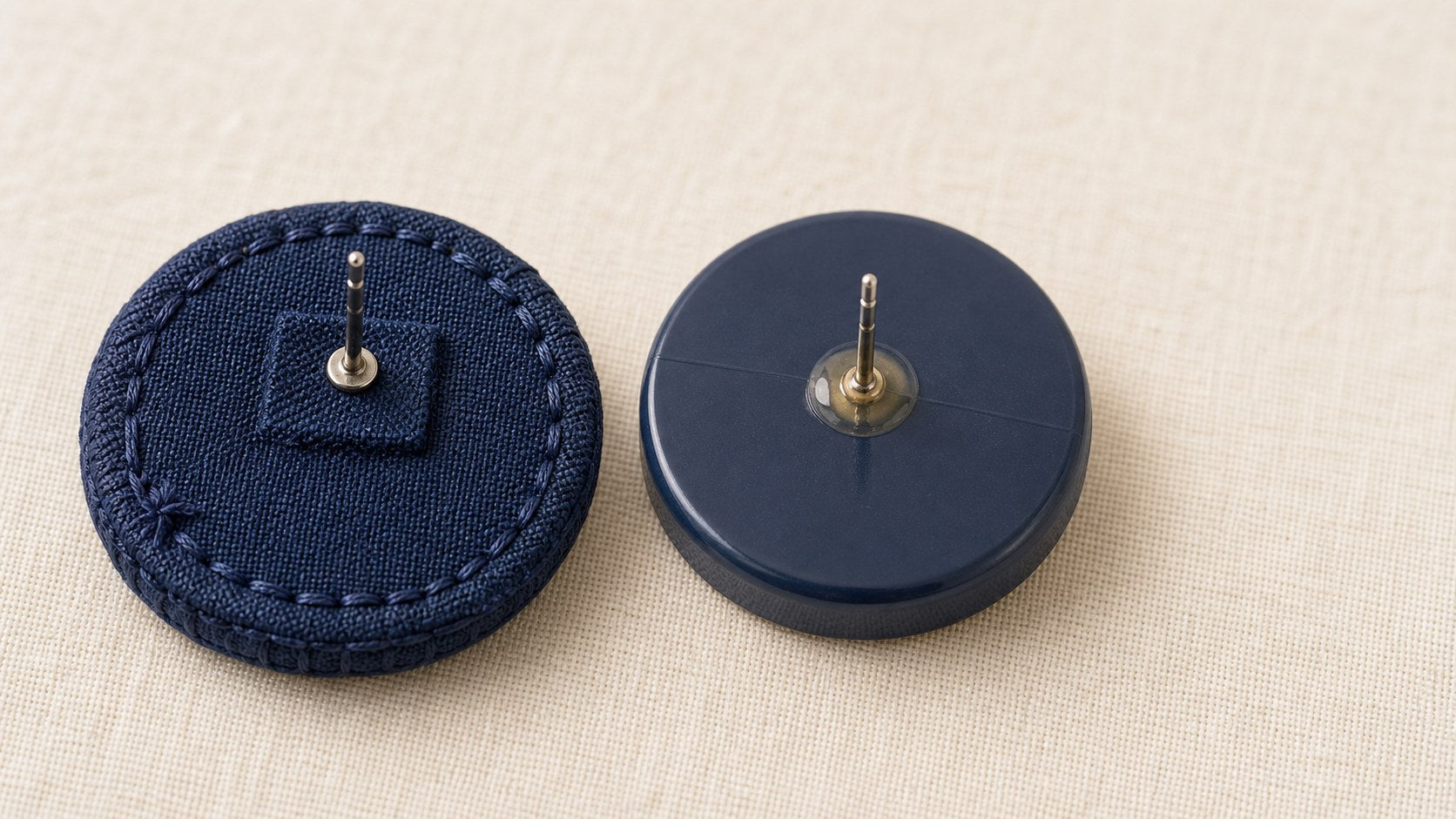 Reverse of a hand-stitched fabric earring beside the smooth moulded back of a mass-produced one — how to tell if jewellery is handmade, House of Falguni