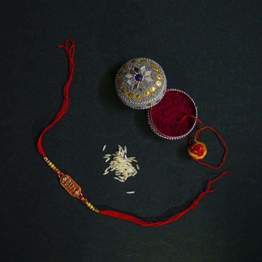 Rakhi gifts for your sister — handcrafted earrings and kurtis by House of Falguni