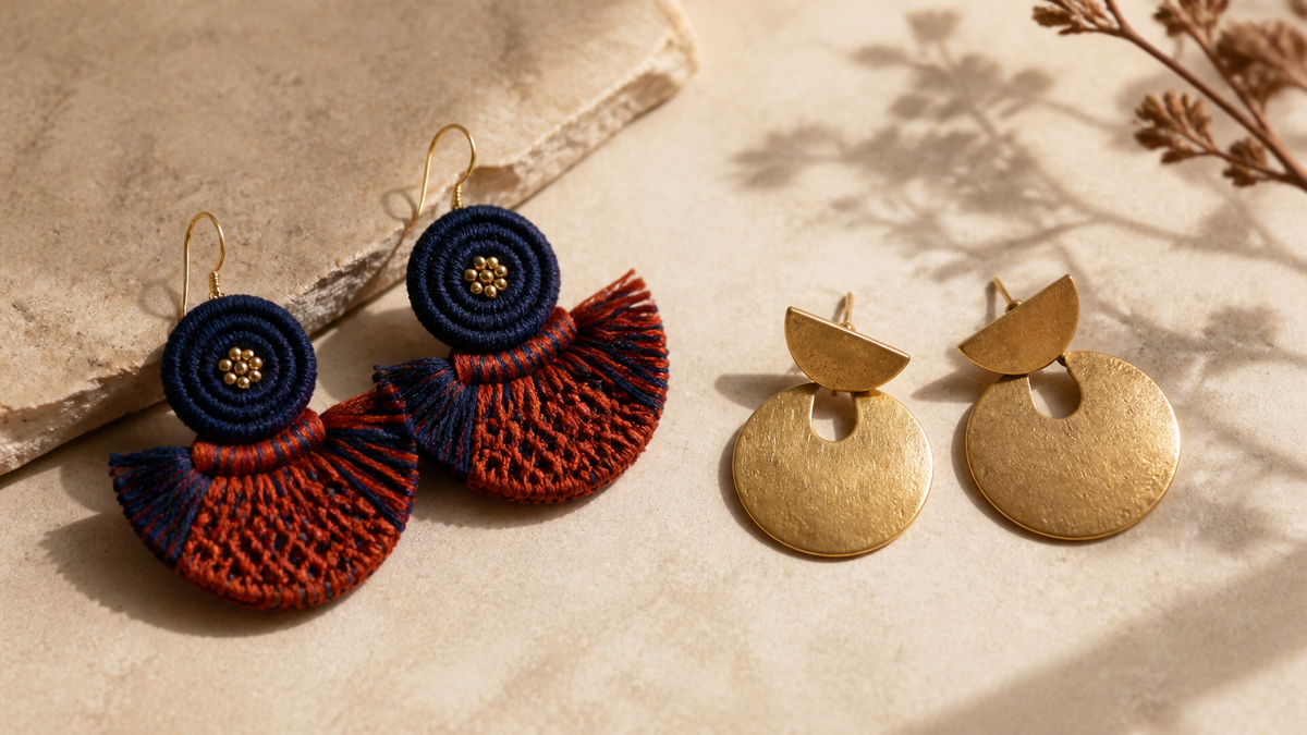 Handcrafted textile earrings and gold-tone metal earrings compared in a side-by-side editorial still life