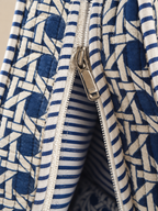 Samudra blue cane print quilted tote, close-up of the zip and the blue-and-white striped lining