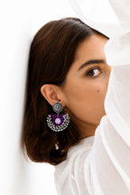 Purple fabric chandbali earring set with a lilac stone and edged in silver ghungroo bells