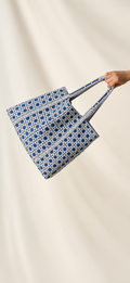 Samudra blue cane print quilted tote held out by its handles