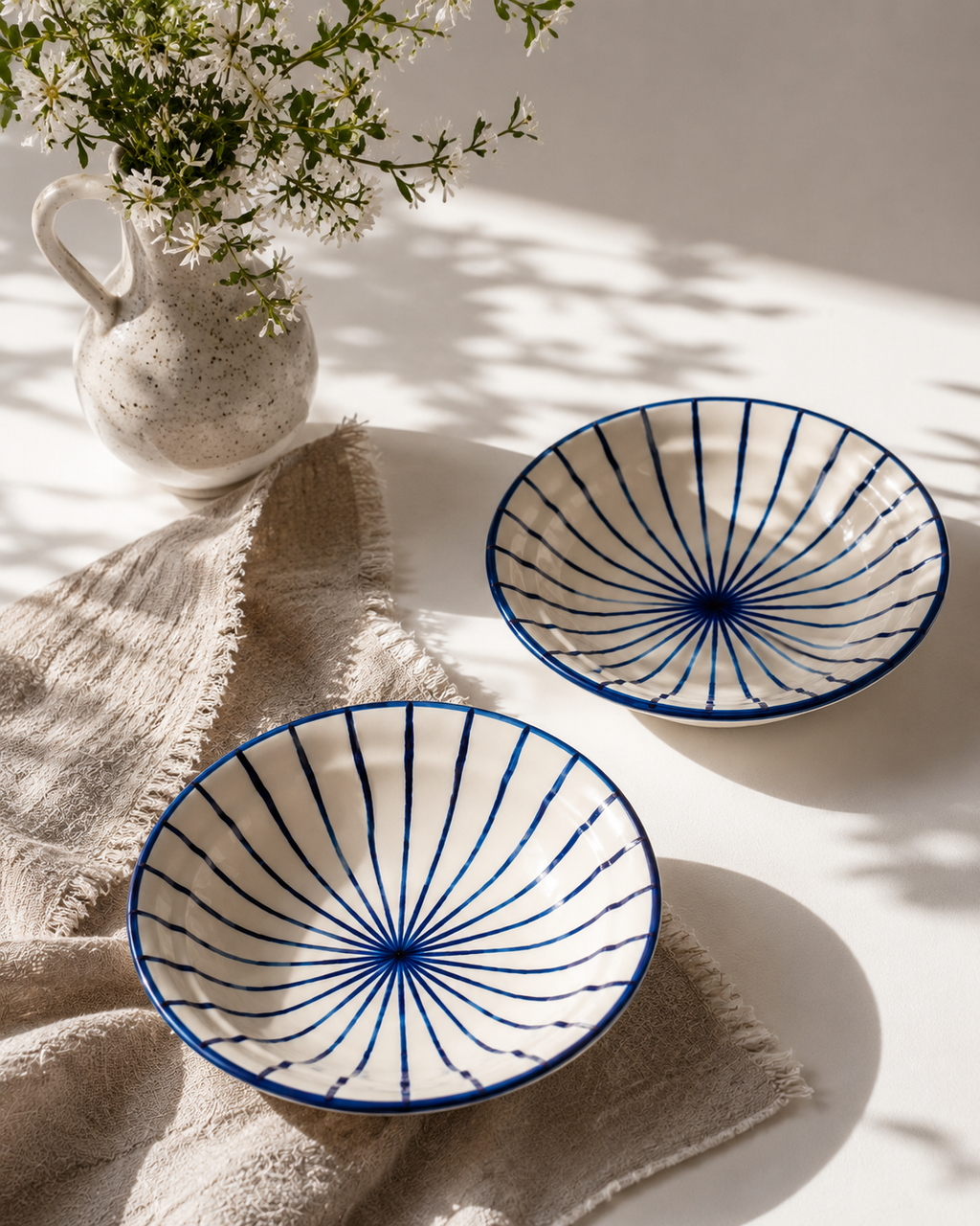 Coastal Bloom Ceramic Pasta Plates — hand-painted floral ceramic pasta plates styled on a table, House of Falguni
