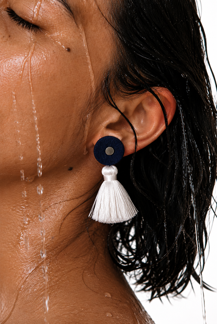 Midnight Mist navy tassel earrings with mirror-work accents and ivory tassels, handcrafted by House of Falguni