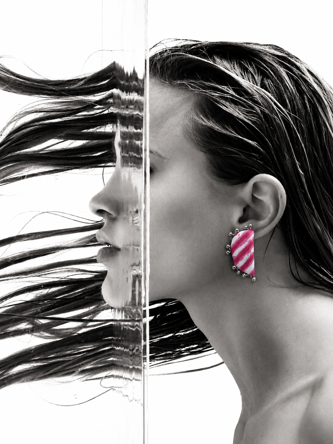Leher Earrings in fuchsia pink Lehariya fabric with silver ghungroo beads, handcrafted by House of Falguni