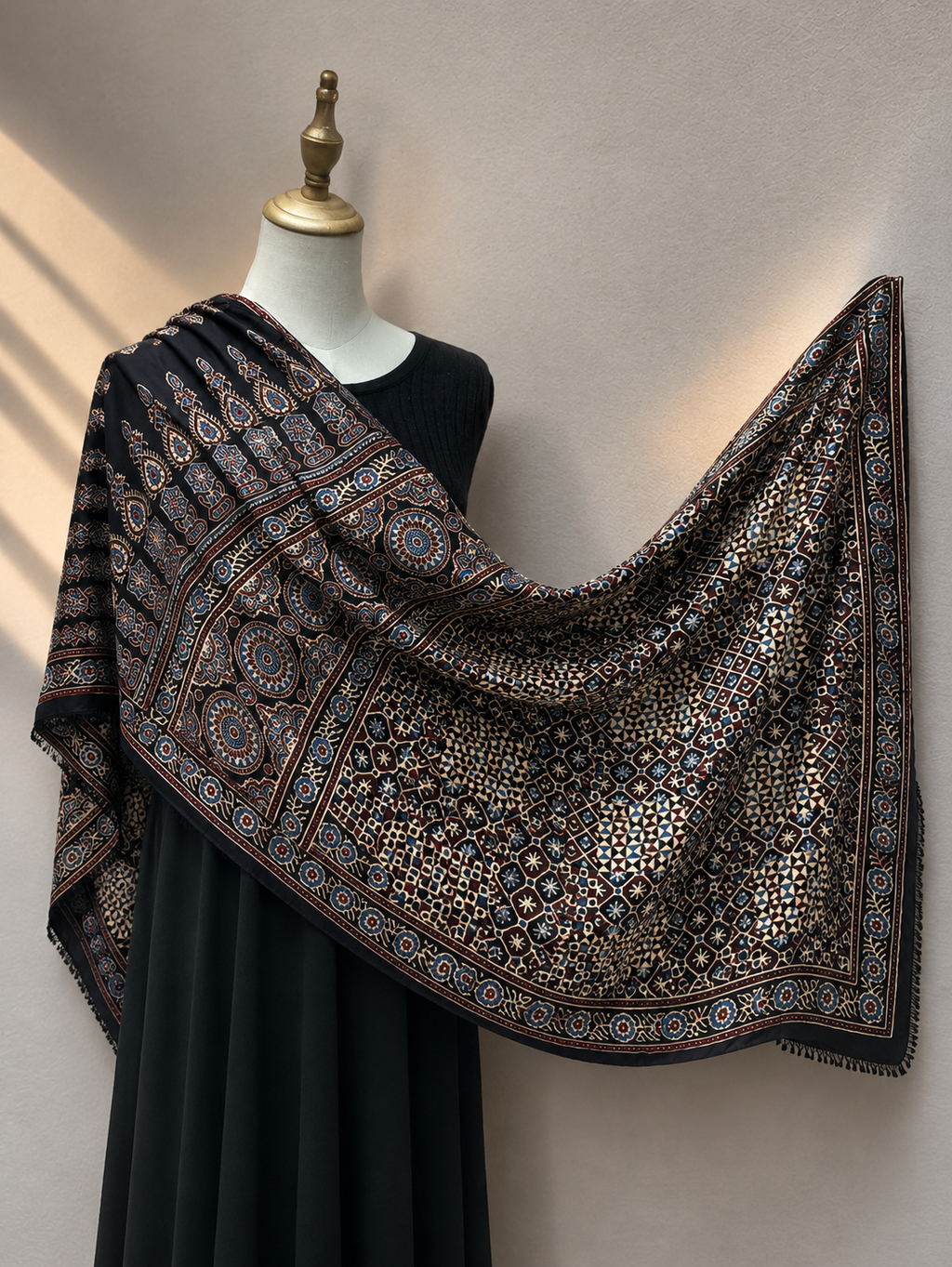 Nilufar Modal Silk Stole — Shahi Ajrakh black Ajrakh stole draped on mannequin India