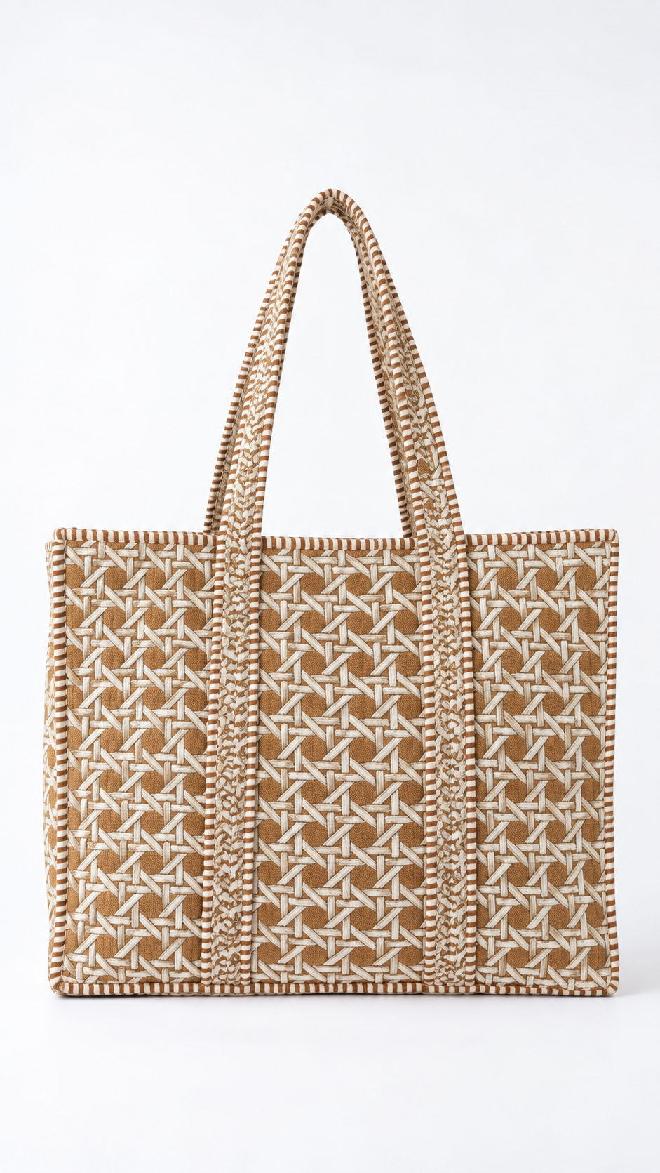 Mitti large quilted tote in a sand and white cane-weave print, front view on white