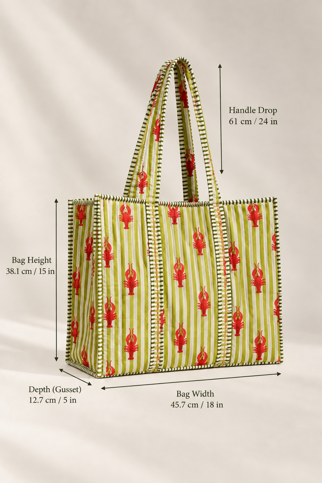 Aakar quilted tote size chart: 18 in (45.7 cm) wide, 15 in (38.1 cm) tall, 5 in (12.7 cm) deep, 24 in (61 cm) handle drop