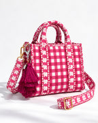 Jamuni silk tassel charm clipped to the Rani Mini Quilted Cotton Tote