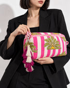 Aabha silk tassel charm clipped to the Gul Quilted Hair Tool Bag