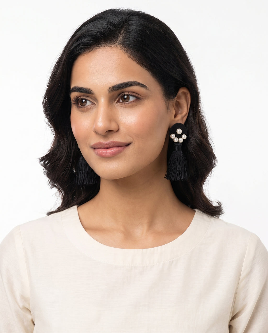 Black Tassel Earrings with Pearl Cluster styled on model (AI-generated styling image)
