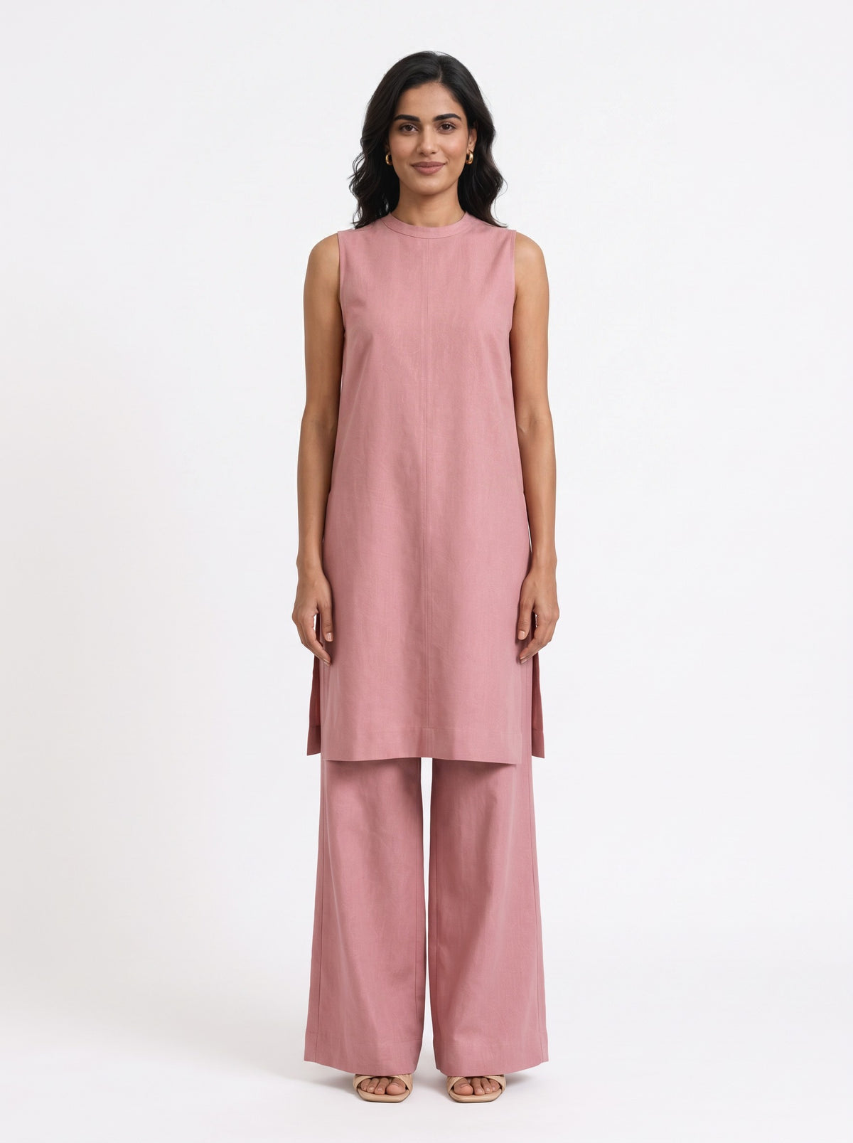 Blush pink Gulshan tunic and wide-leg pants co-ord styled on model (AI-generated styling image)