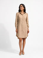 Beige Ibrik shirt dress styled on model (AI-generated styling image)