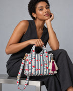 Abeer silk tassel charm clipped to the Jal Mini Quilted Cotton Tote