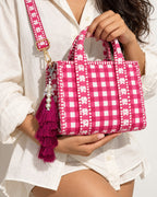 Gulabi silk tassel charm clipped to the Rani Mini Quilted Cotton Tote