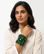 Rangriti Charm Bangles styled on model (AI-generated styling image)
