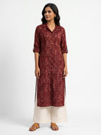 Dark maroon Ruby Raga ikat collar kurta styled on model (AI-generated styling image)